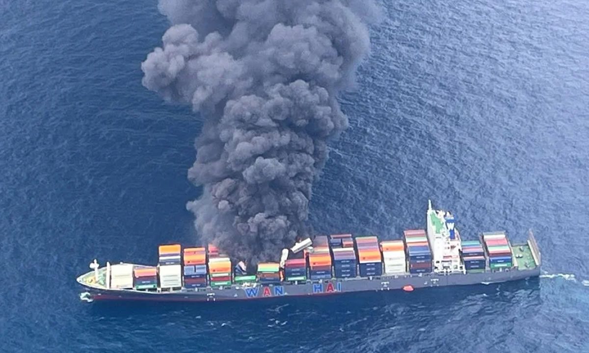 Indian coast guard battles massive fire on container ship listing off Kerala