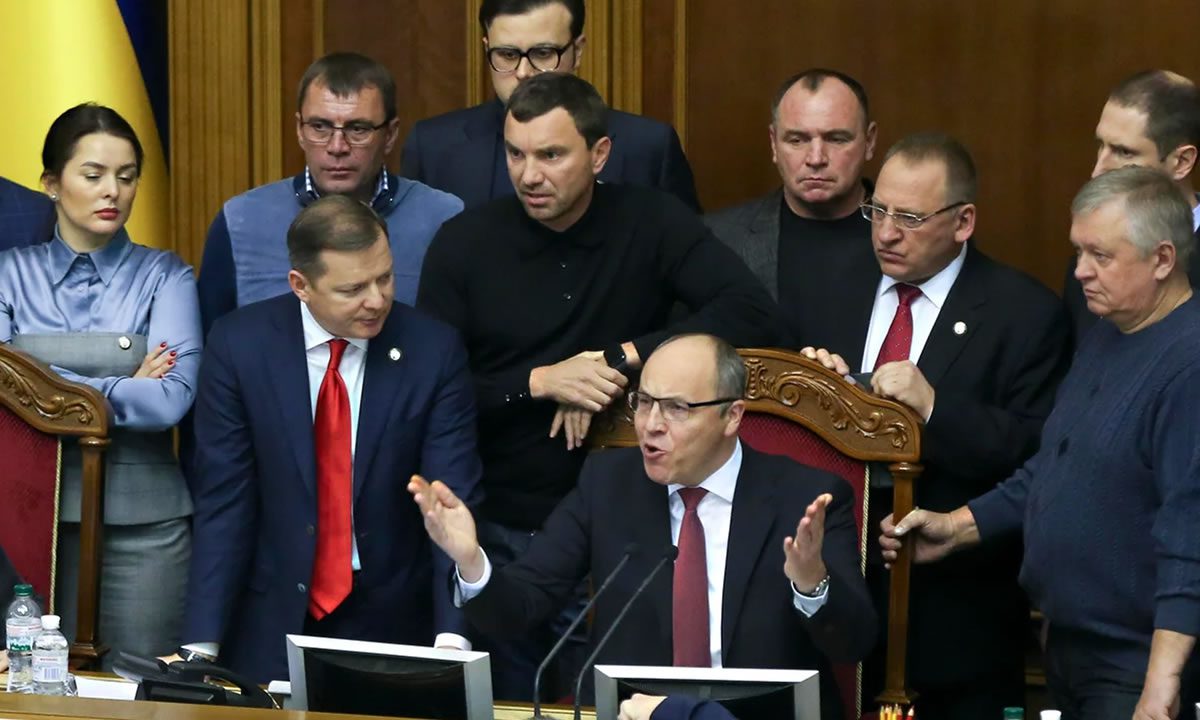 Ukrainian lawmakers listen to parliament speaker Andriy Parubiy, center, during a parliament session in Kiev, Ukraine, Monday, Nov. 26, 2018. Efrem Lukatsky / AP