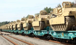 Train with M1A1 Abrams tanks. USA. Photo credits: freeredar.shop