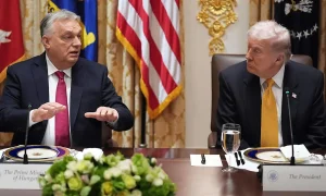 Hungary's Prime Minister Viktor Orban speaks during a meeting with President Donald Trump, right, in the Cabinet Room of the White House, Friday, Nov. 7, 2025, in Washington. (AP Photo/Evan Vucci)ASSOCIATED PRESS